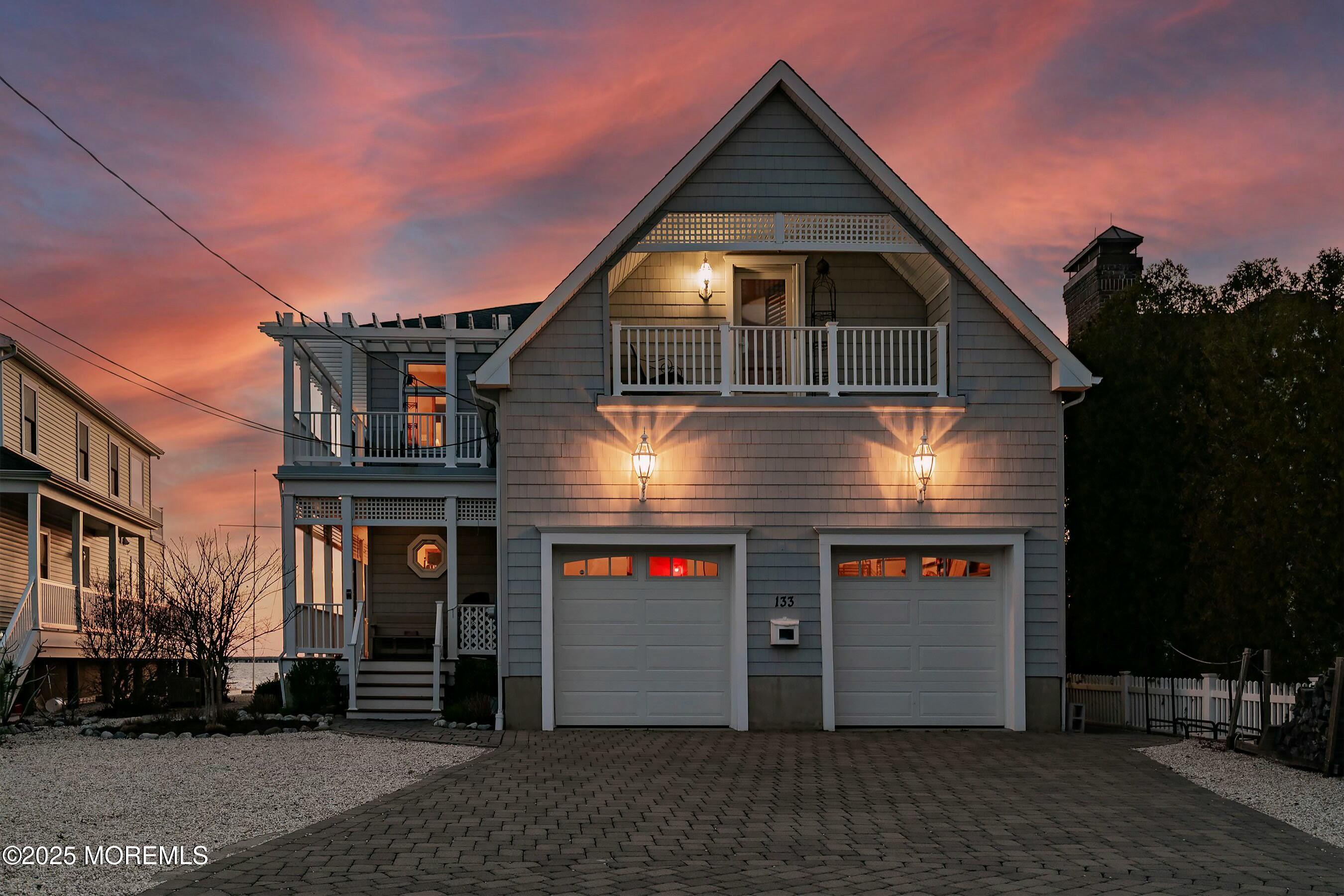 133 Pershing Boulevard Lavallette, NJ 08735 - Photo 73 of 86 a view of a house with a garage