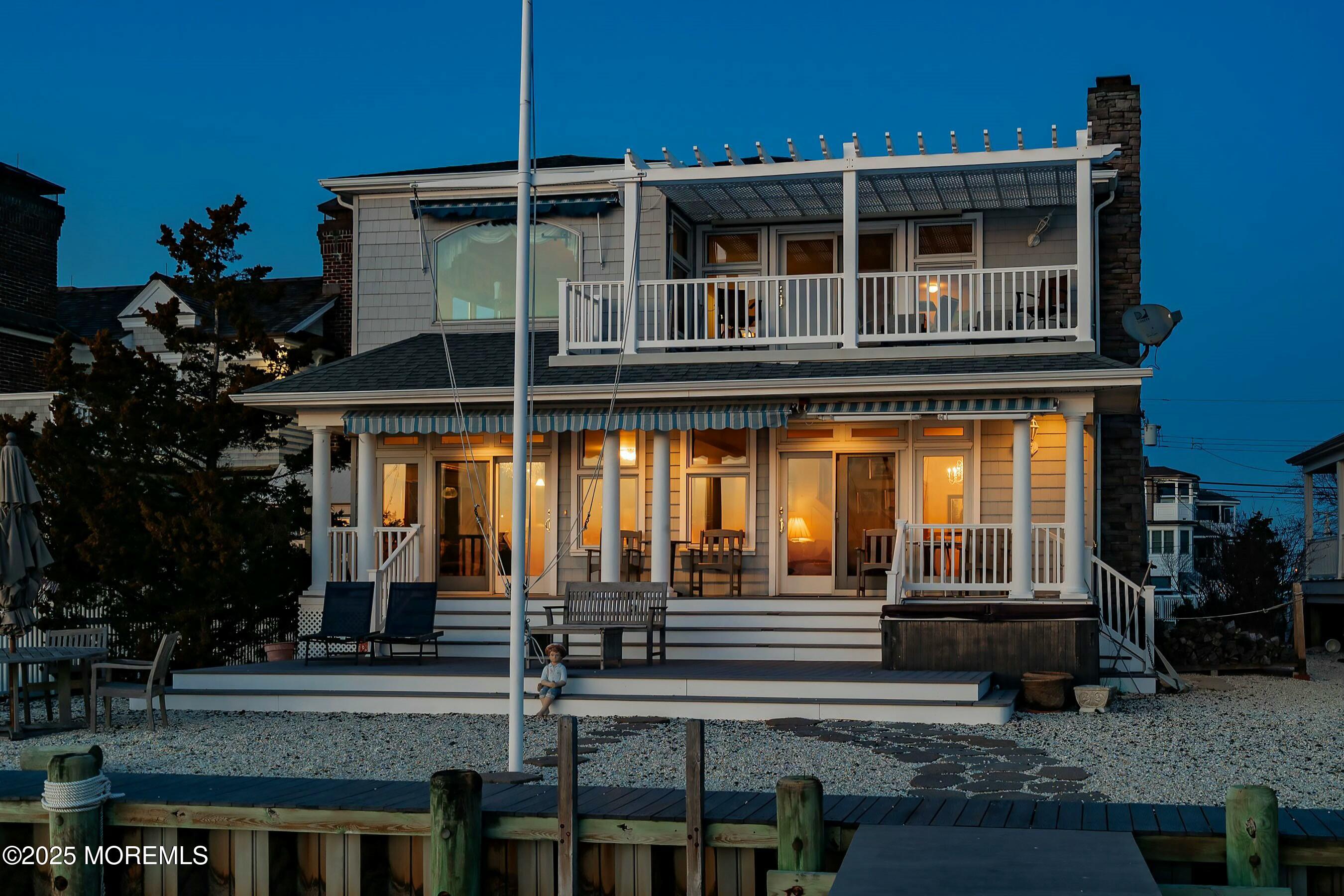 133 Pershing Boulevard Lavallette, NJ 08735 - Photo 80 of 86 front view of a house with a porch