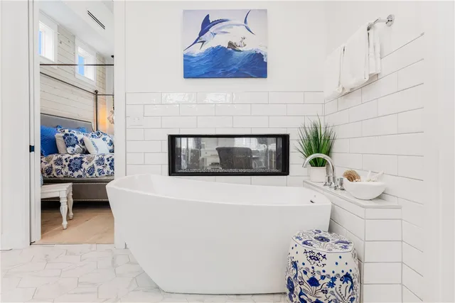 a bathroom with a double vanity sink mirror and