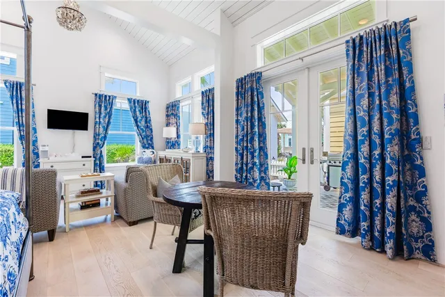 a view of a dining room with furniture window and outside view