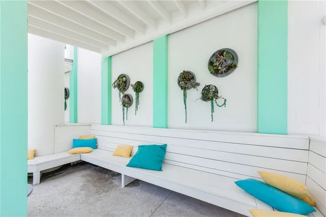 a view of balcony with wooden floor and city view