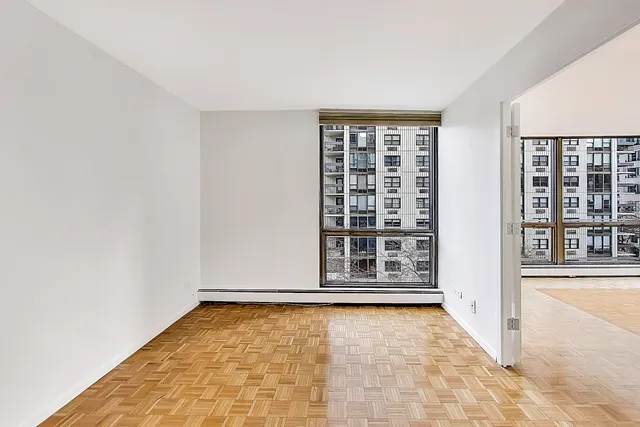 an empty room with windows