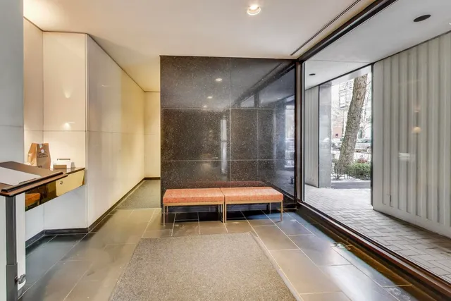 a bathroom with a tub and a shower