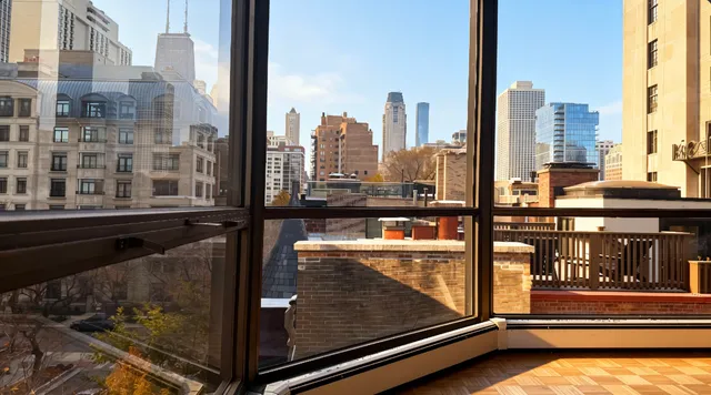 a view of a city with tall buildings