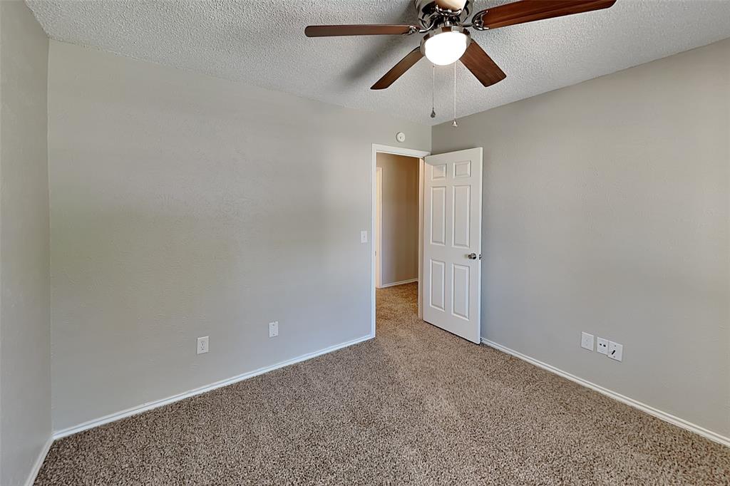 604 Ashby Place Allen, TX 75002 - Photo 13 of 21 an empty room with a ceiling fan