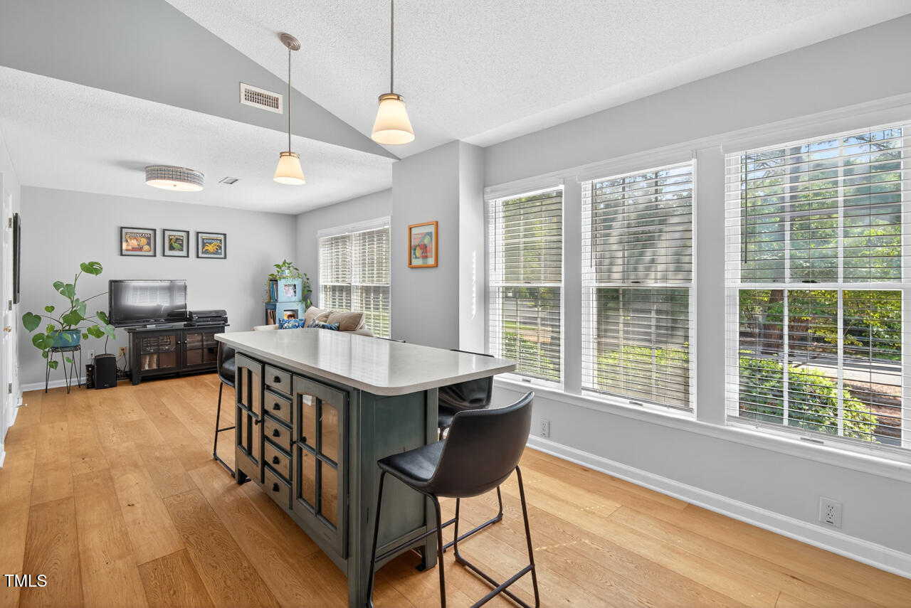 123 Weatherhill Point Carrboro, NC 27510 - Photo 14 of 25 a dining room with furniture and wooden floor