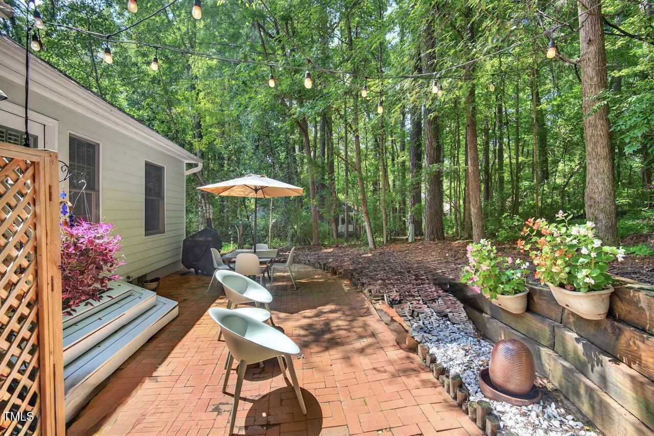 123 Weatherhill Point Carrboro, NC 27510 - Photo 19 of 25 a front view of a house with a yard