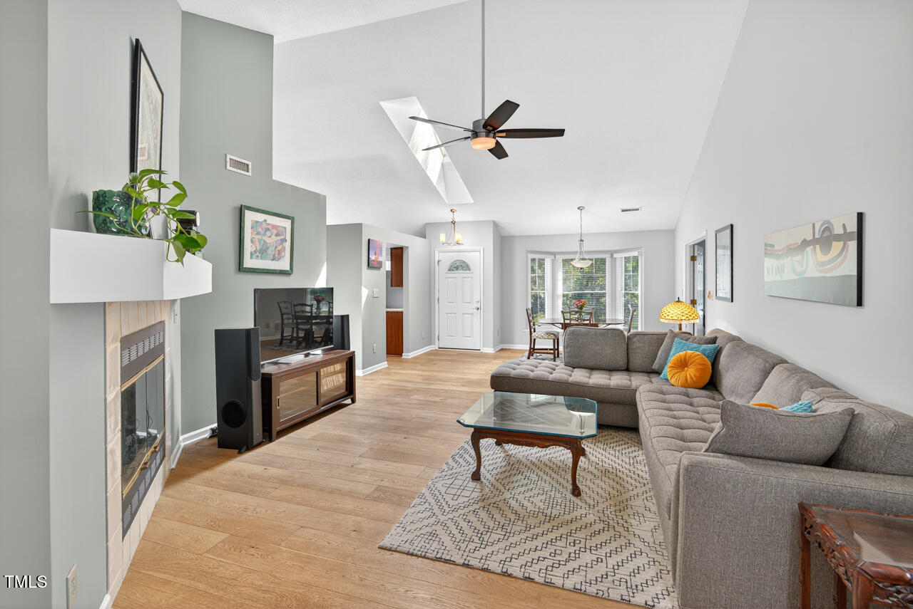 123 Weatherhill Point Carrboro, NC 27510 - Photo 3 of 25 a living room with furniture and a kitchen view