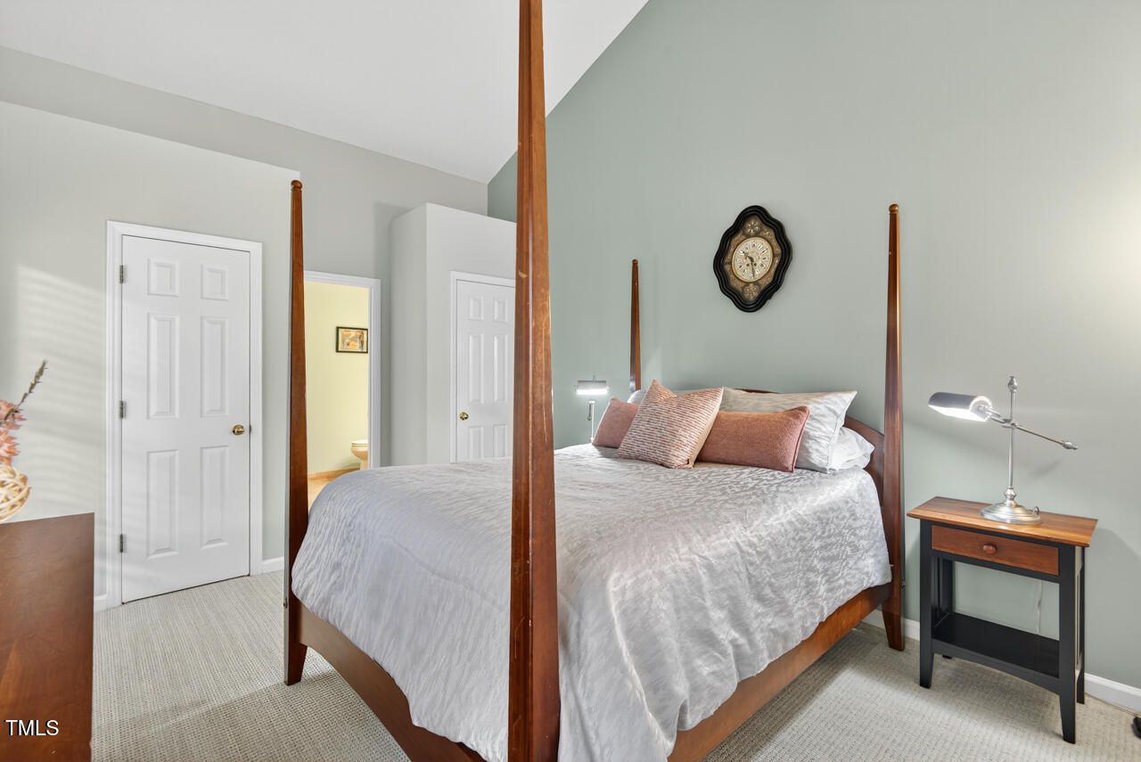 123 Weatherhill Point Carrboro, NC 27510 - Photo 8 of 25 a bedroom with a bed and a table