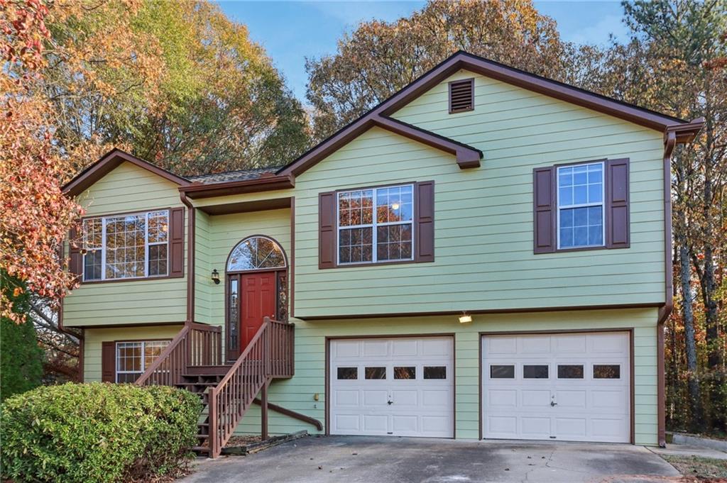 572 Casey's Crossing Winder, GA 30680 - Photo 1 of 31 a front view of a house with a yard