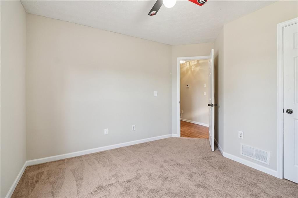 572 Casey's Crossing Winder, GA 30680 - Photo 18 of 31 a view of an empty room