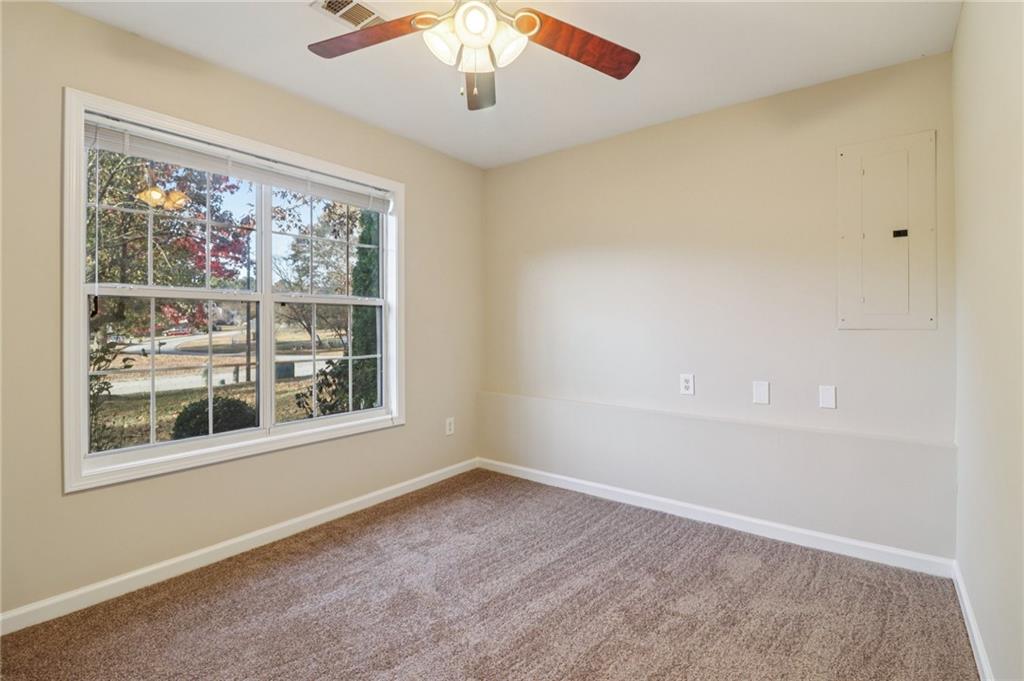 572 Casey's Crossing Winder, GA 30680 - Photo 24 of 31 an empty room with a window