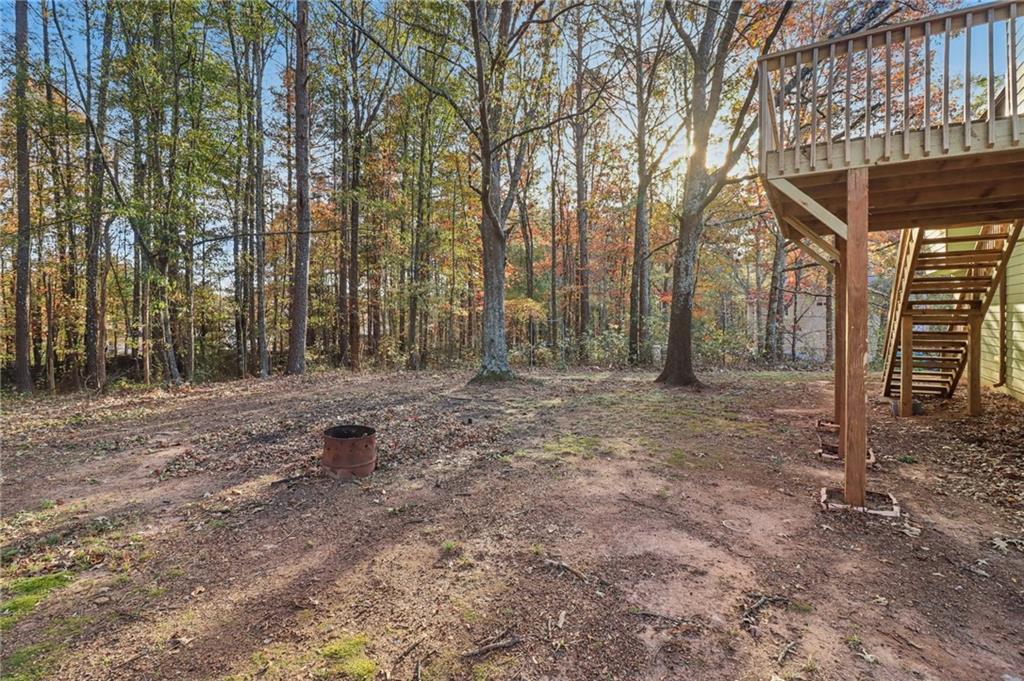 572 Casey's Crossing Winder, GA 30680 - Photo 28 of 31 a backyard of a house with lots of green space