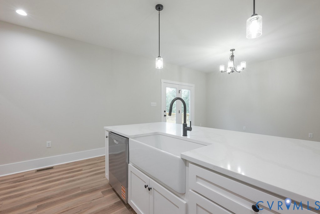 1 Tabscott Road Kents Store, VA 23084 - Photo 20 of 42 Kitchen island featuring a white apron front sink,