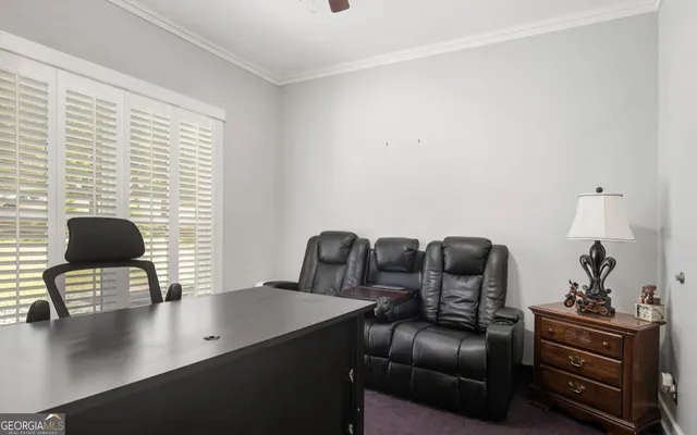 a view of workspace with a couch