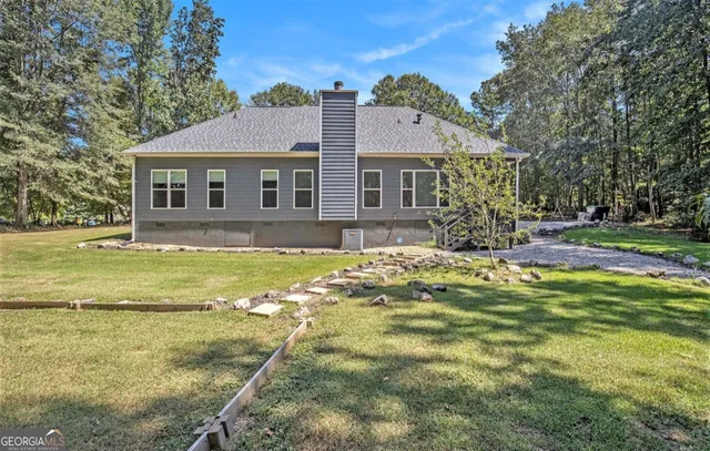 a front view of a house with swimming pool