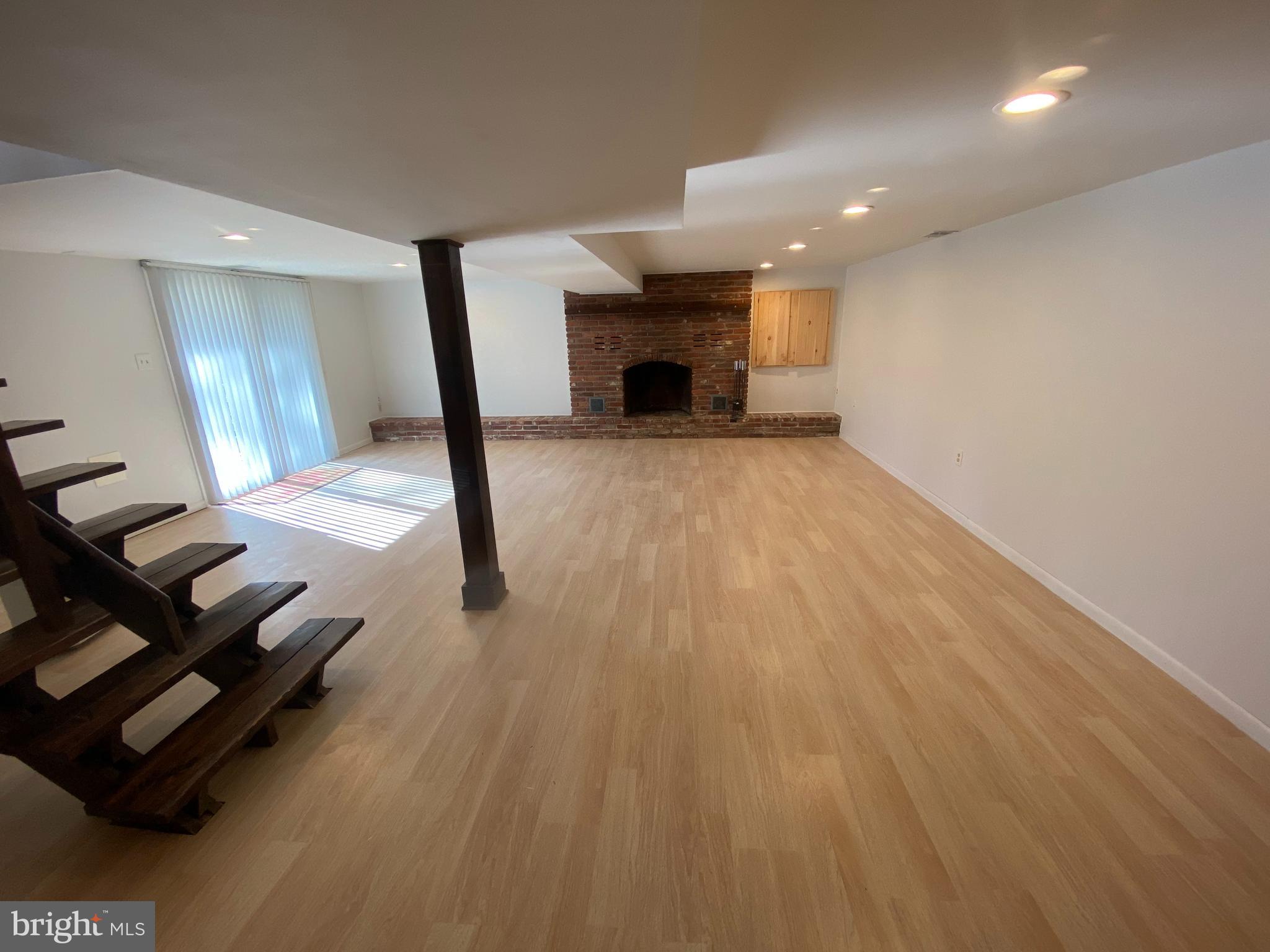 31 Acorn Drive Elkton, MD 21921 - Photo 44 of 52 Finished basement with wood burning fireplace