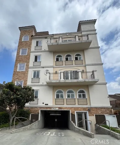 a front view of a building with balcony