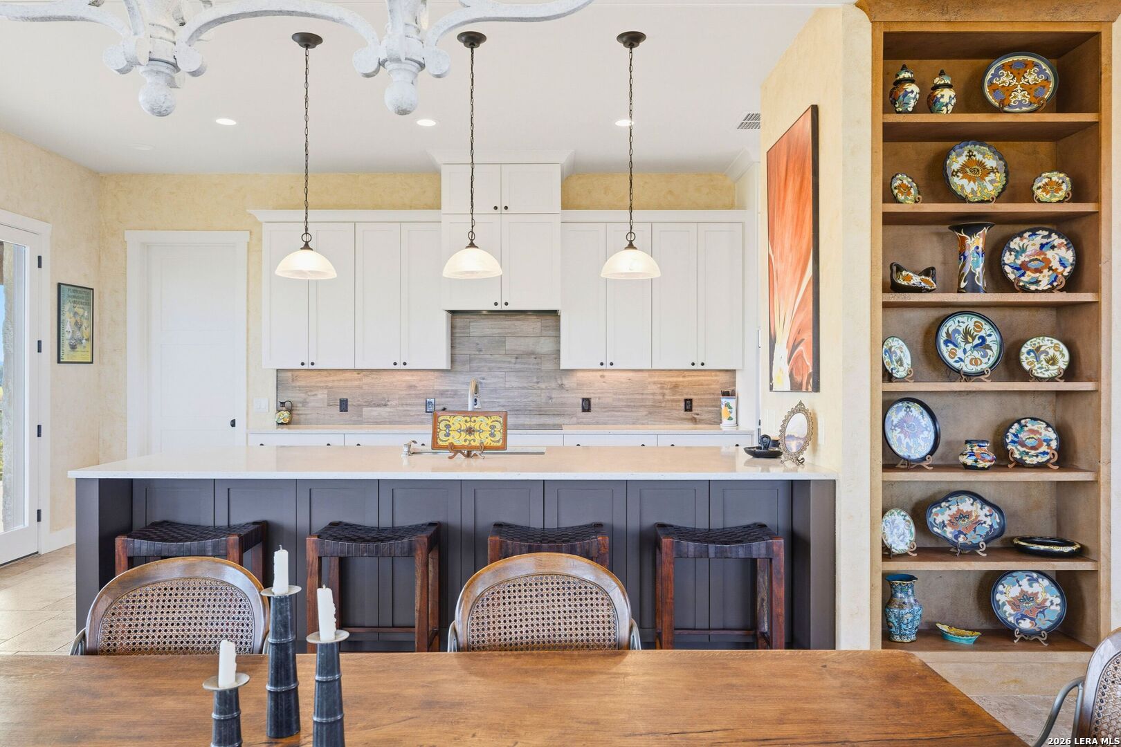 1600 Brushy Ridge Trail Blanco, TX 78606 - Photo 17 of 43 a kitchen with stainless steel appliances granite countertop wooden cabinets sink and stove