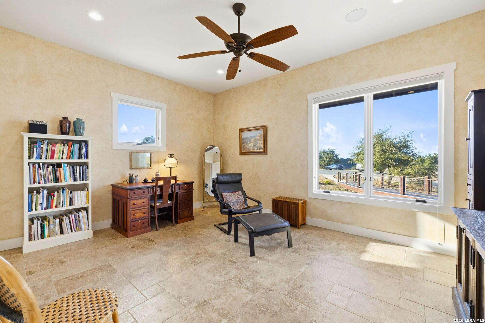 1600 Brushy Ridge Trail Blanco, TX 78606 - Photo 28 of 43 a living room with furniture and a book shelf