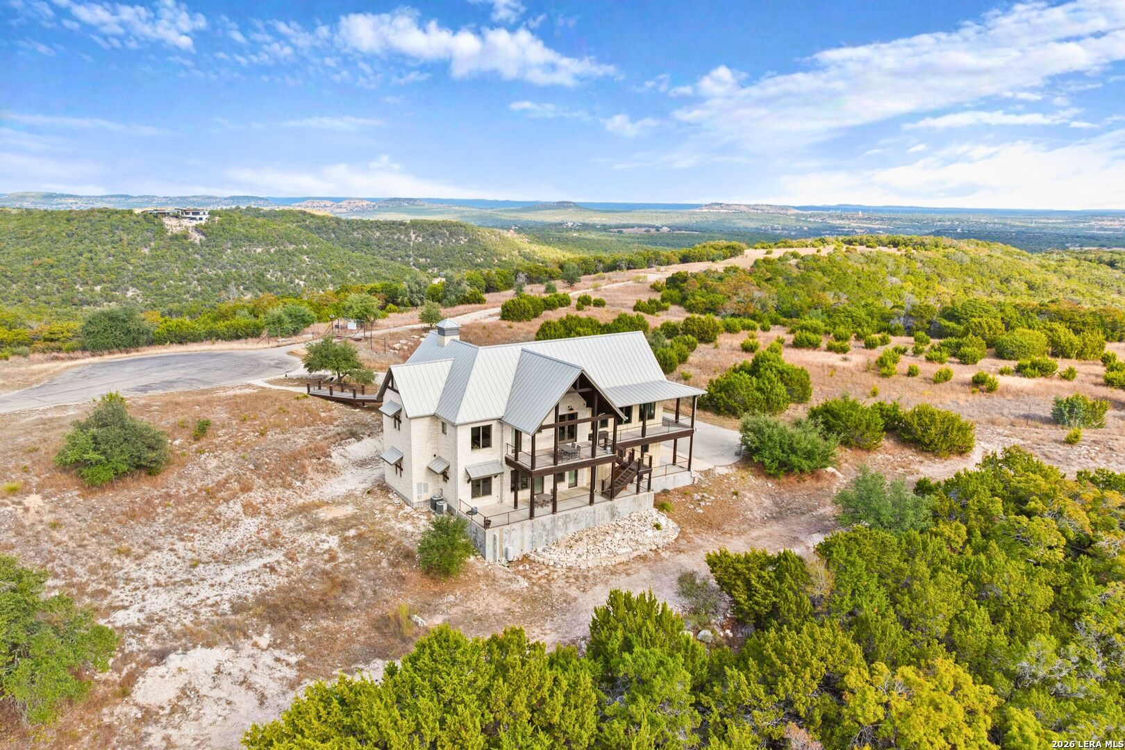1600 Brushy Ridge Trail Blanco, TX 78606 - Photo 3 of 43 an aerial view of residential houses with outdoor space