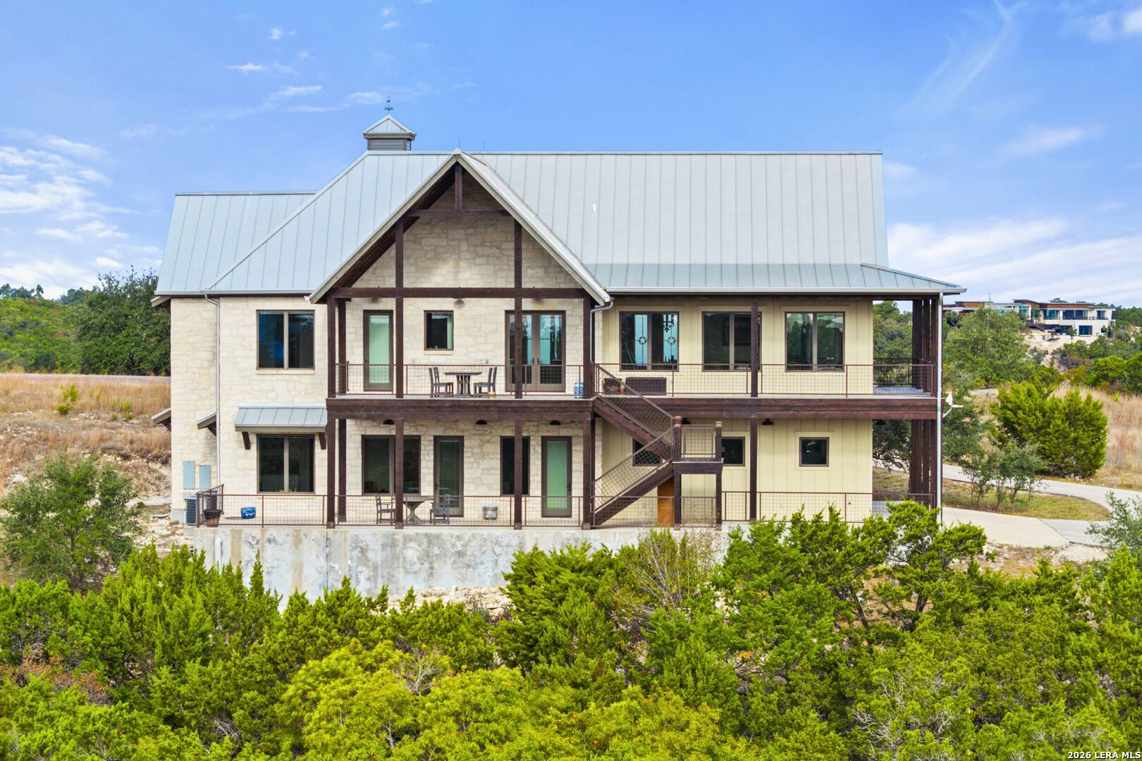 1600 Brushy Ridge Trail Blanco, TX 78606 - Photo 38 of 43 a front view of a house with a garden