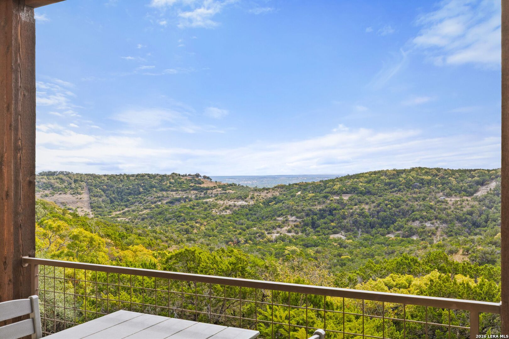 1600 Brushy Ridge Trail Blanco, TX 78606 - Photo 8 of 43 a view of a city from a balcony