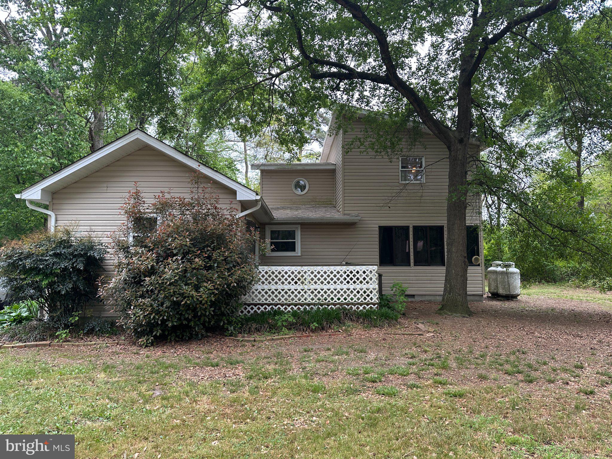 28403 Old Eden Road Eden, MD 21822 - Photo 43 of 46 a front view of a house with garden