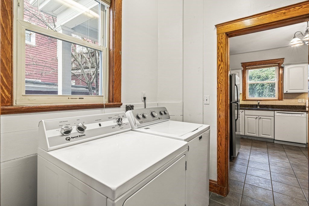 73 Halifax Street Boston, MA 02130 - Photo 16 of 18 a utility room with a sink and cabinets