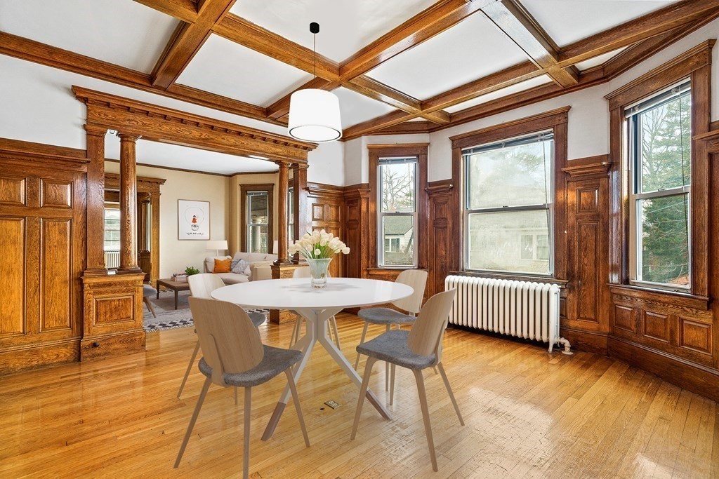 73 Halifax Street Boston, MA 02130 - Photo 2 of 18 a view of a dining room with furniture window and wooden floor