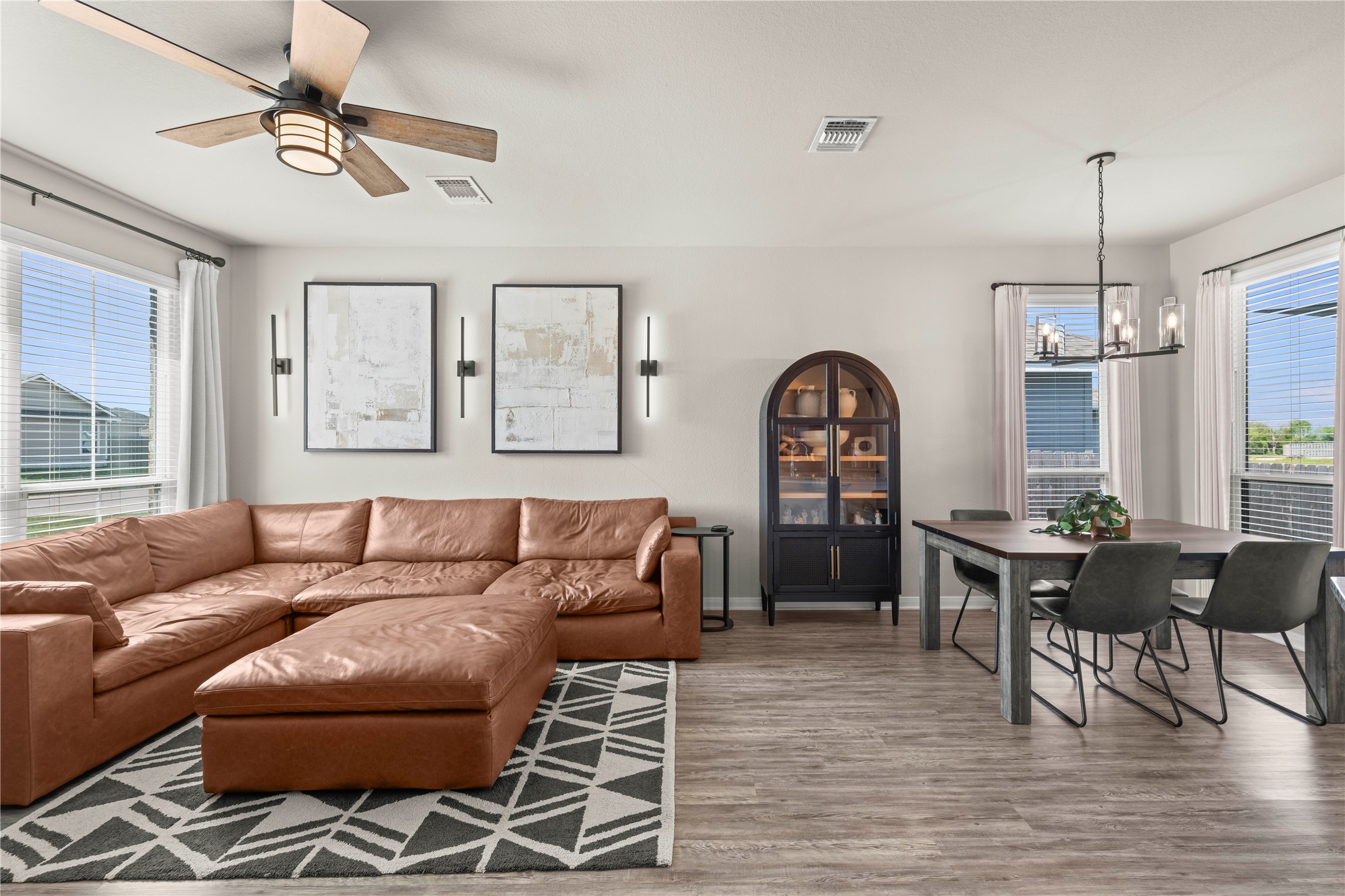 3018 Clevelander Drive Temple, TX 76504 - Photo 11 of 21 a living room with furniture a window and a chandelier