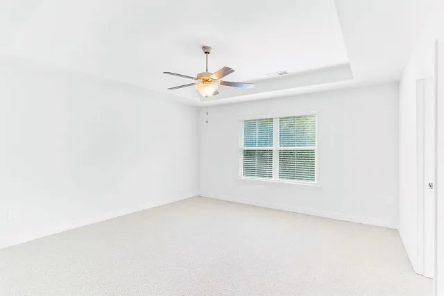 a view of a small space with a fan