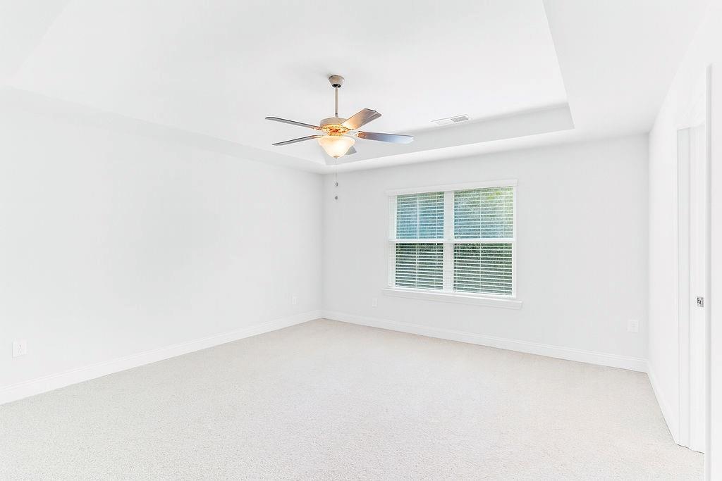 70 Cooper Drive Mansfield, GA 30055 - Photo 16 of 32 an empty room with a window