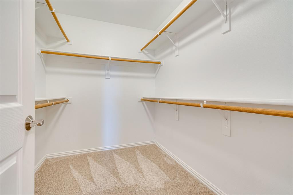 9109 Perimeter Street Denton, TX 76207 - Photo 22 of 27 Walk in closet with carpet