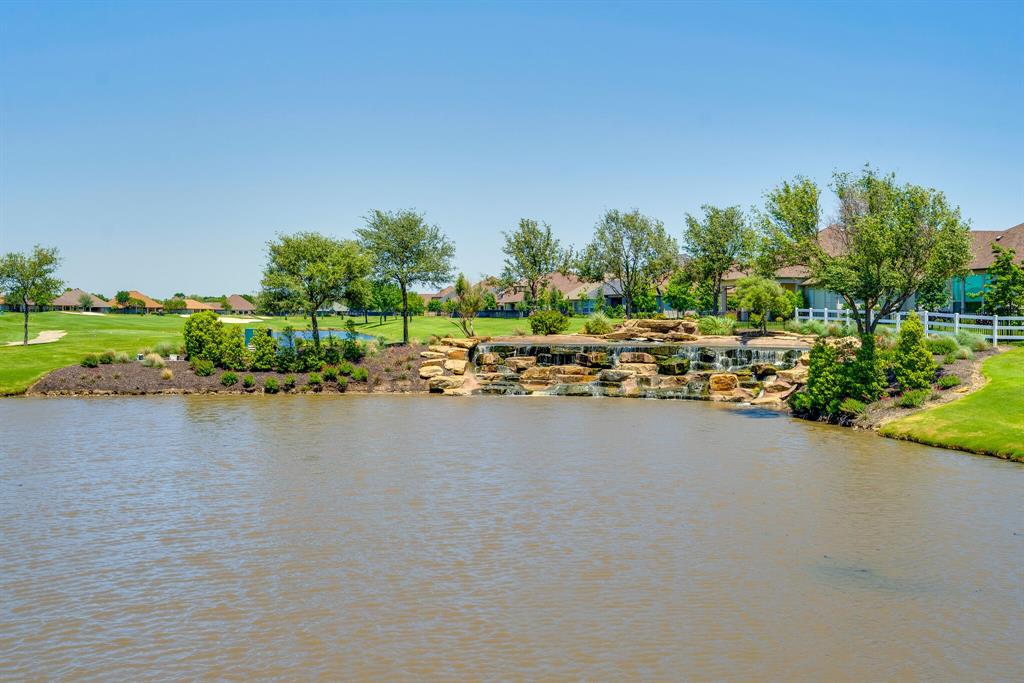 9109 Perimeter Street Denton, TX 76207 - Photo 23 of 27 Water view featuring nearby suburban area