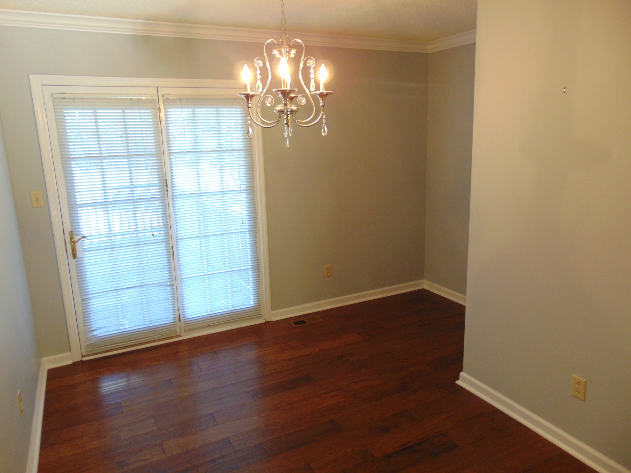 1684 Springplace Road Lewisburg, TN 37091 - Photo 18 of 48 a view of empty room with wooden floor and fan