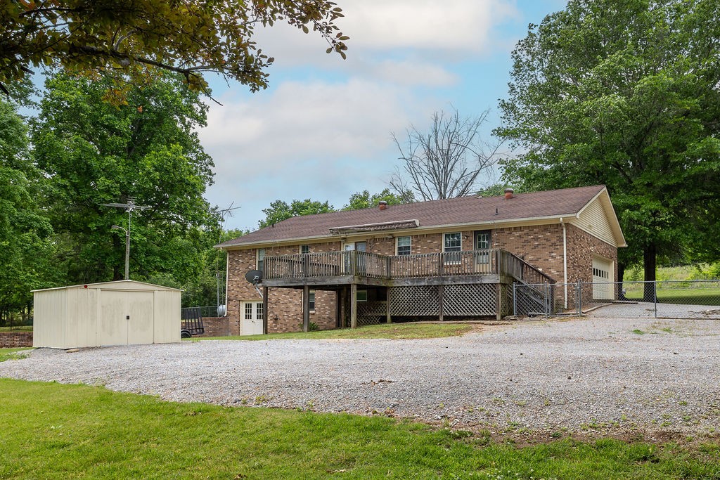 1684 Springplace Road Lewisburg, TN 37091 - Photo 20 of 31 a front view of a house with a yard and garage