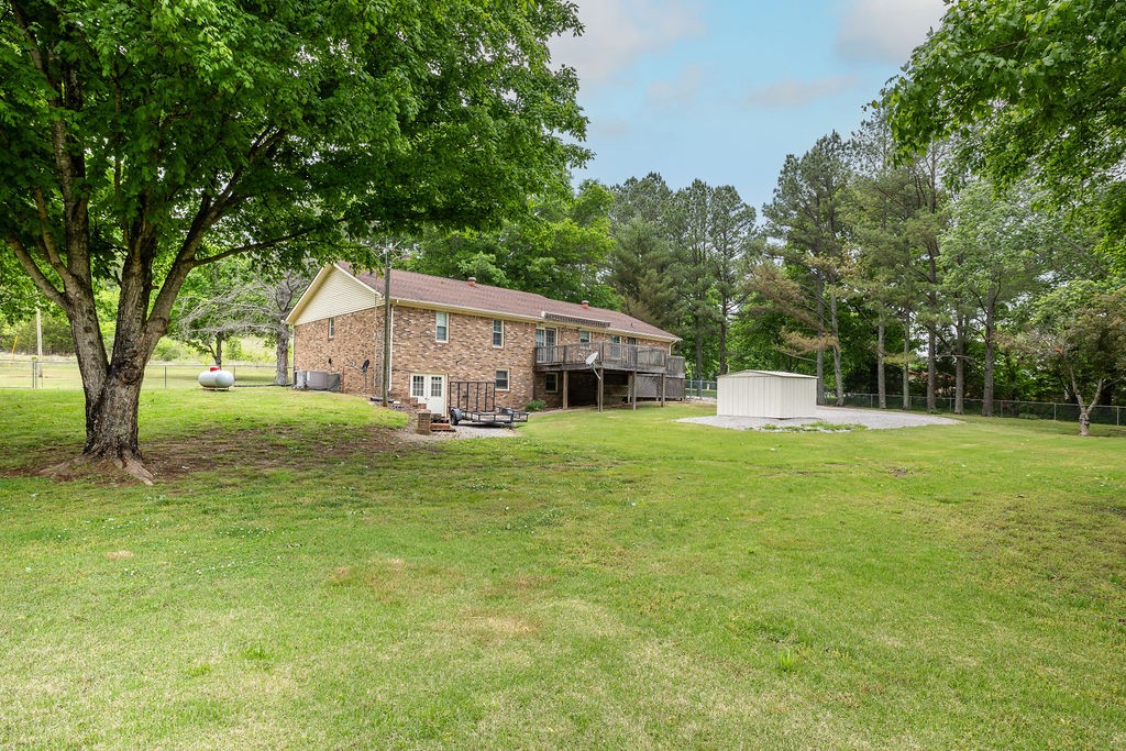 1684 Springplace Road Lewisburg, TN 37091 - Photo 22 of 31 a front view of a house with garden