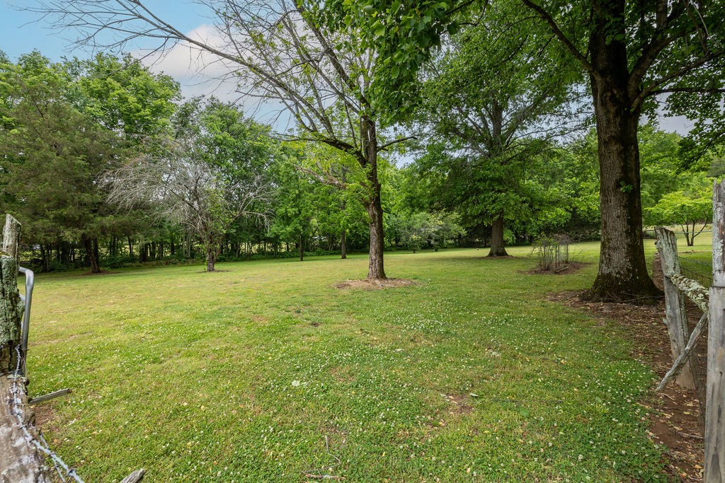 1684 Springplace Road Lewisburg, TN 37091 - Photo 25 of 31 a view of outdoor space with deck and yard