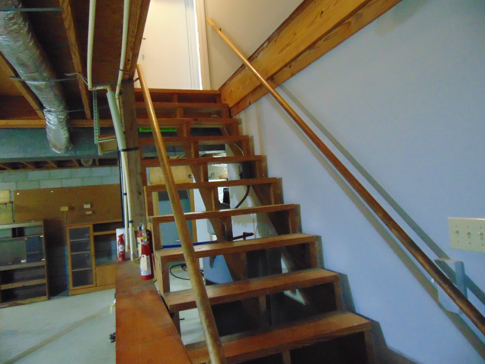 1684 Springplace Road Lewisburg, TN 37091 - Photo 26 of 48 a view of staircase with lots of frames on wall and a potted plant