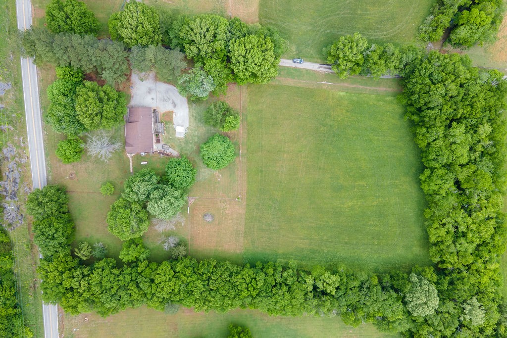 1684 Springplace Road Lewisburg, TN 37091 - Photo 28 of 31 an aerial view of residential house with an outdoor space and seating area