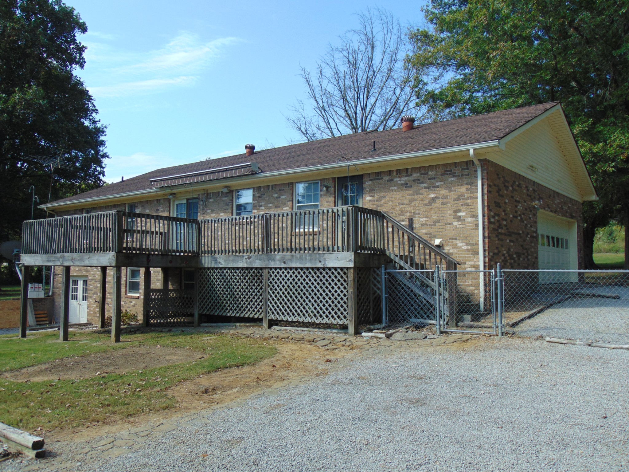 1684 Springplace Road Lewisburg, TN 37091 - Photo 41 of 48 a view of a house with a yard and garage