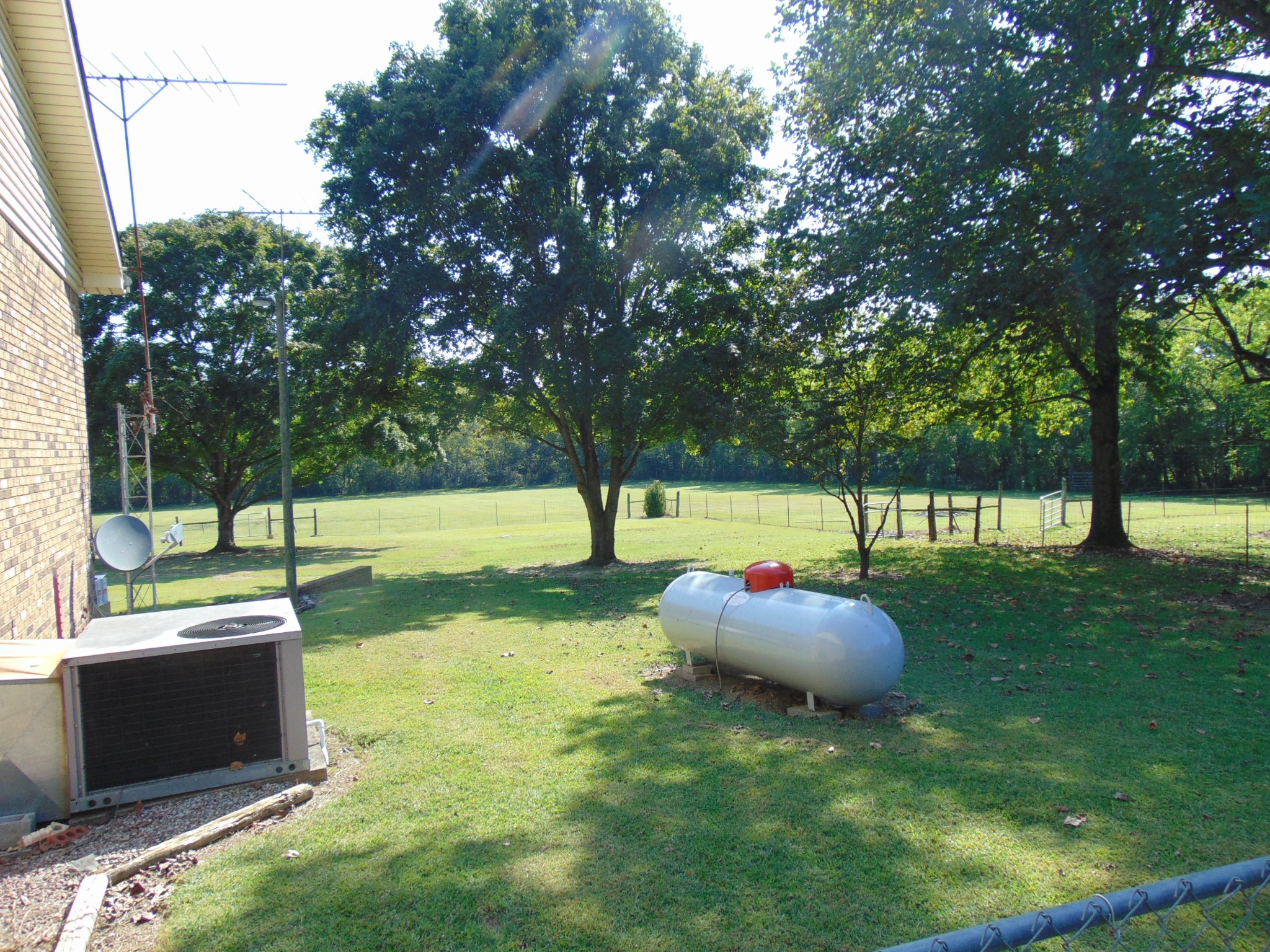 1684 Springplace Road Lewisburg, TN 37091 - Photo 47 of 48 a backyard of a house with table and chairs