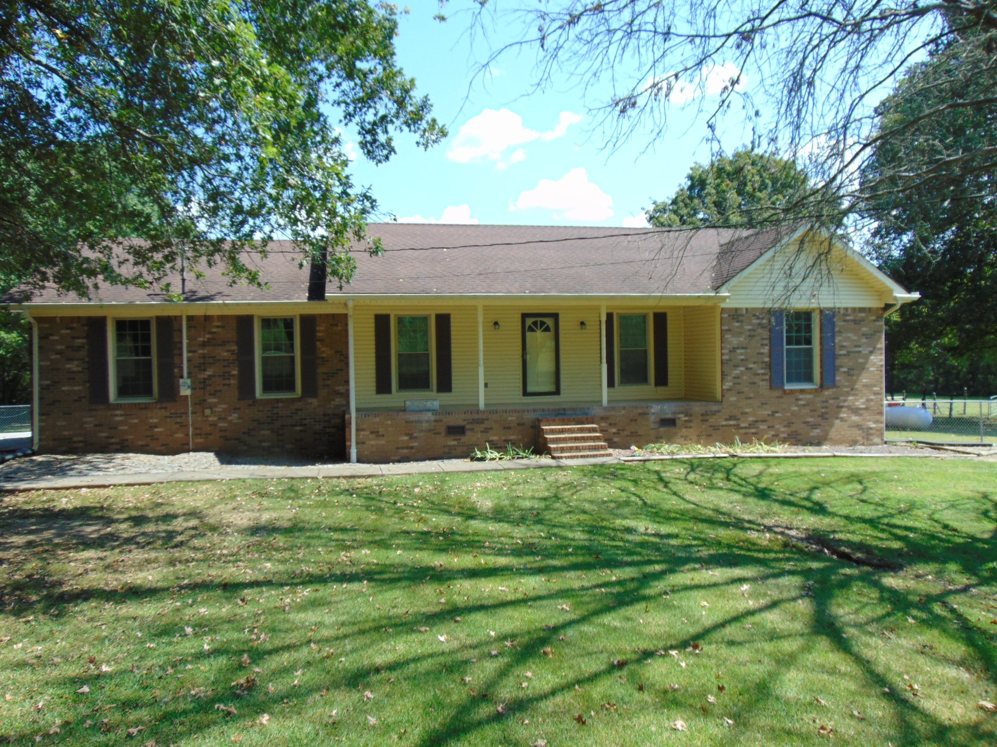 1684 Springplace Road Lewisburg, TN 37091 - Photo 48 of 48 a front view of a house with a yard