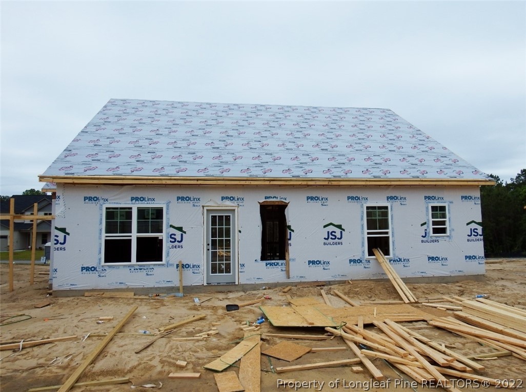 1721 Cherry Point Fayetteville, NC 28306 - Photo 4 of 4 a front view of a house with white walls
