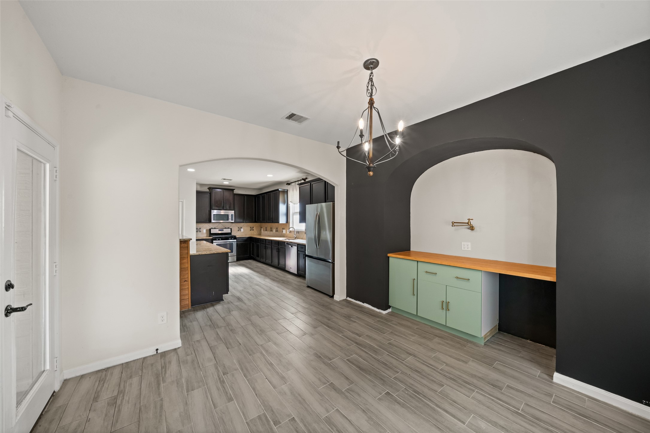 9107 Nina Road Conroe, TX 77304 - Photo 13 of 30 Coffee bar in dining area with extra storage!