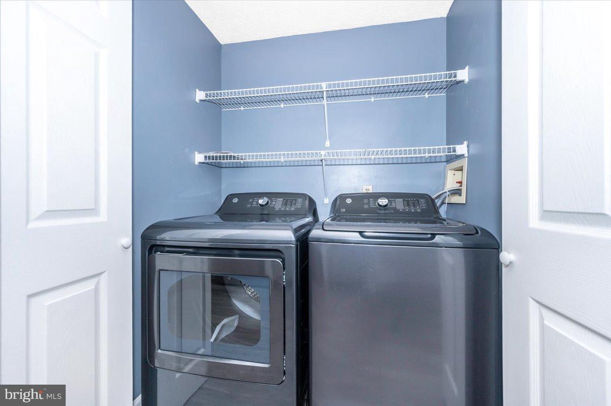 12284 Bandera Lane Lusby, MD 20657 - Photo 18 of 55 Modern laundry space with sleek appliances.