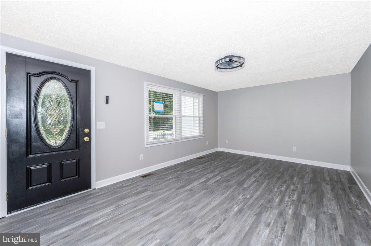 12284 Bandera Lane Lusby, MD 20657 - Photo 3 of 55 Bright and airy entryway with modern charm.
