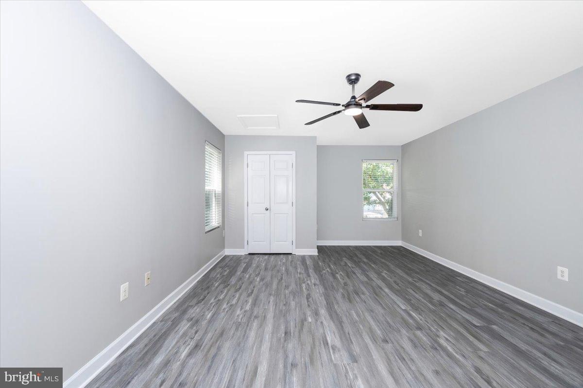 12284 Bandera Lane Lusby, MD 20657 - Photo 31 of 55 wooden floor in an empty room with a window
