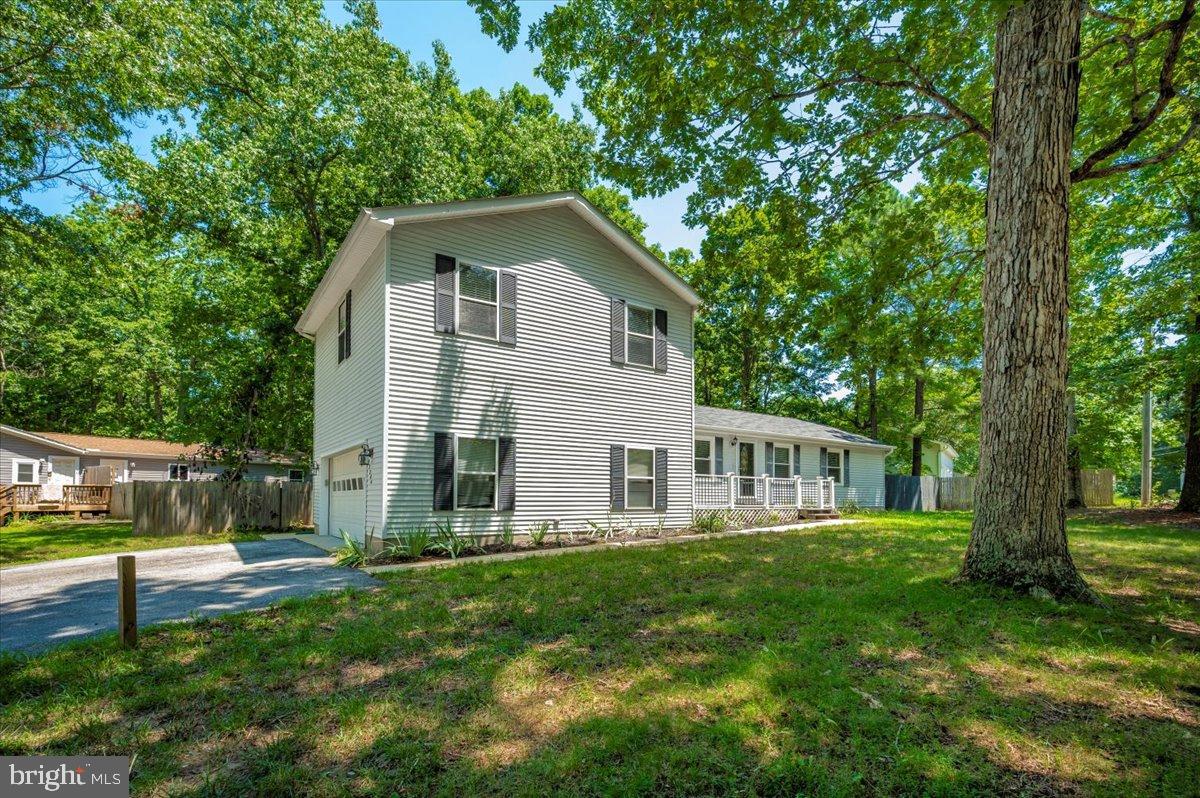 12284 Bandera Lane Lusby, MD 20657 - Photo 49 of 55 a house view with a garden space